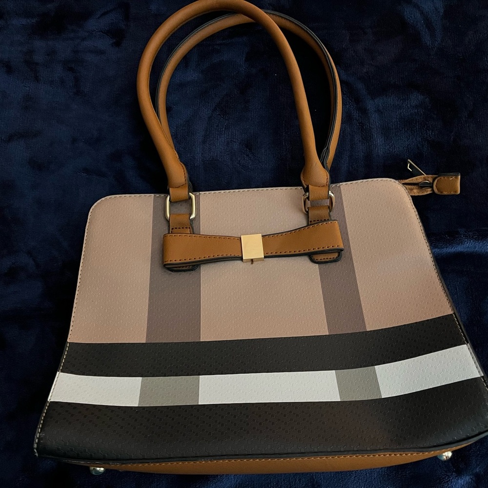 Sophisticated Brown and Black Satchel with Structured Design